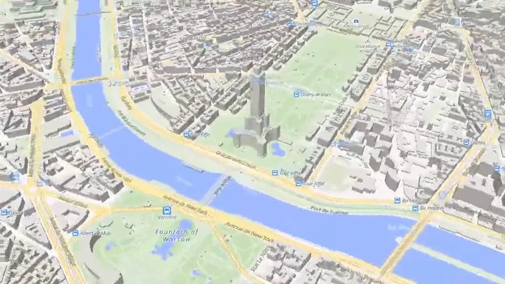 A looping clip of Paris drawn in 3D. The camera circles once around the Eiffel Tower while tilting in from a wide angle, and ends on a closer view of the tower and the Seine.